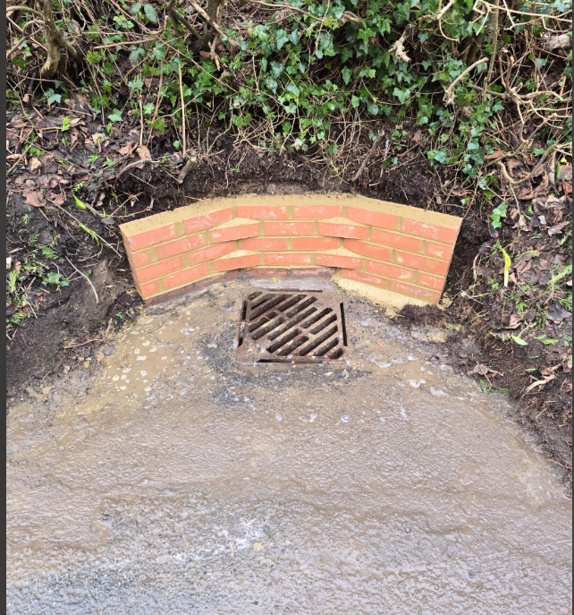 Brickwork to rear of gully